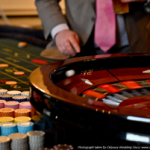 Roulette games at A K Casino Knights man in pink wedding tie