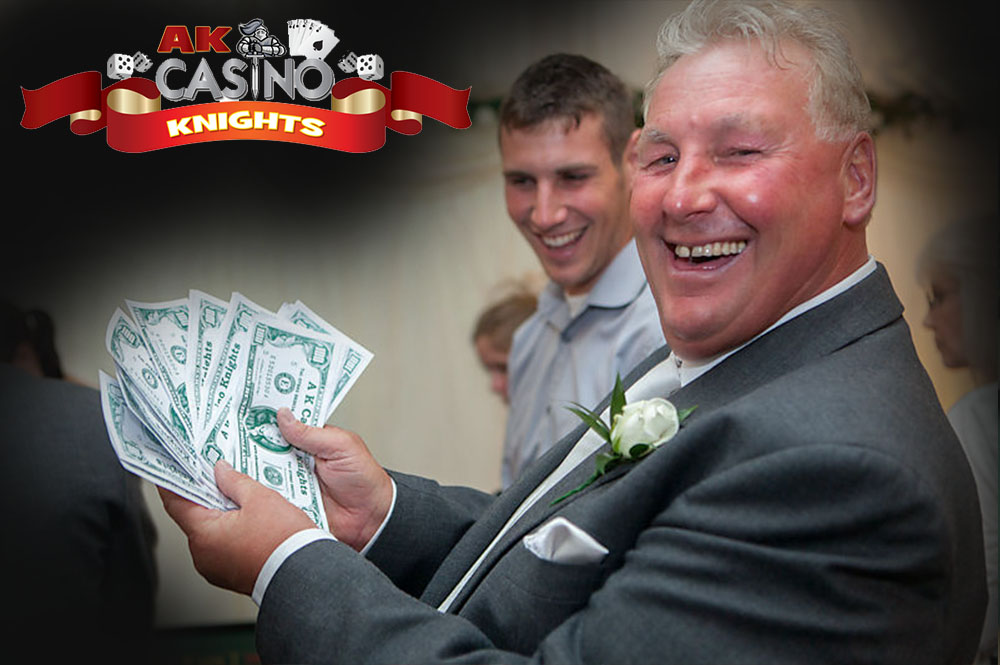 Men winning money at the wedding casino tables