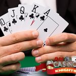 Royal flush held by dealer at casino poker game